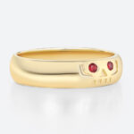 Round Cut Ruby Ring Wide Band Ring with Engraved Skull Design in Yellow Gold