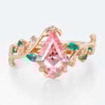 Kite Cut Nature-Inspired Pink Sapphire Ring with Emerald Leaf Accents in Rose Gold