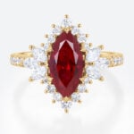 Marquise Cut Lab Ruby Engagement Ring​ with Feather-Inspired Gallery in Yellow Gold