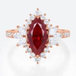 Marquise Cut Lab Ruby Engagement Ring​ with Feather-Inspired Gallery in Rose Gold