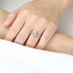 1.7ct Moss Agate Ring​ Marquise Cut Three Stone Engagement Ring With Ribbon-Style Detail in Rose Gold