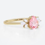 1.6ct Pear Cut Pink Sapphire Engagement Ring with Opal Accents in Yellow Gold