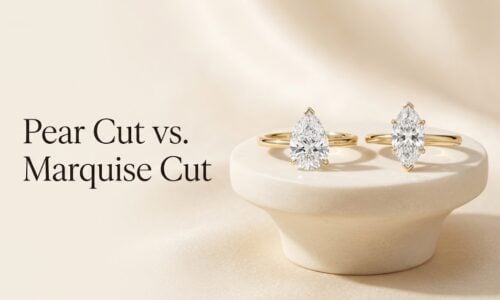 Pear-shaped and marquise-cut diamond engagement rings displayed side by side